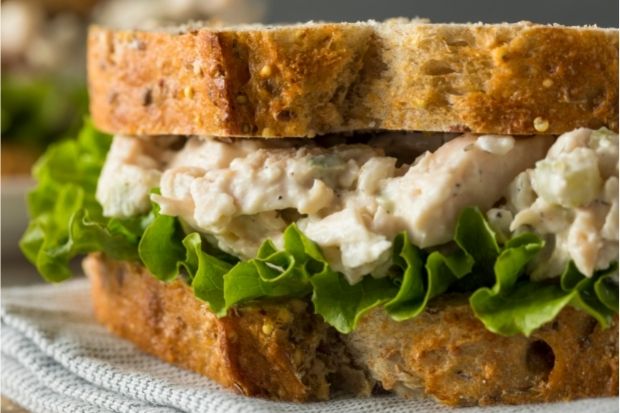 Closeup of a chicken salad sandwich, which is a great way to enjoy cold chicken
