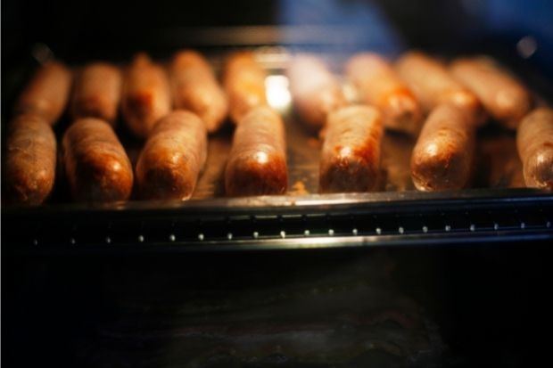 Sausages in oven that need to be checked if they're cooked
