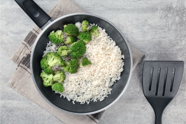 Rice and broccoli cooked in a pan after cook learned how to cook microwave rice without a microwave