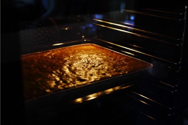 Brownies baking in the oven after chef added too much water to brownie mix