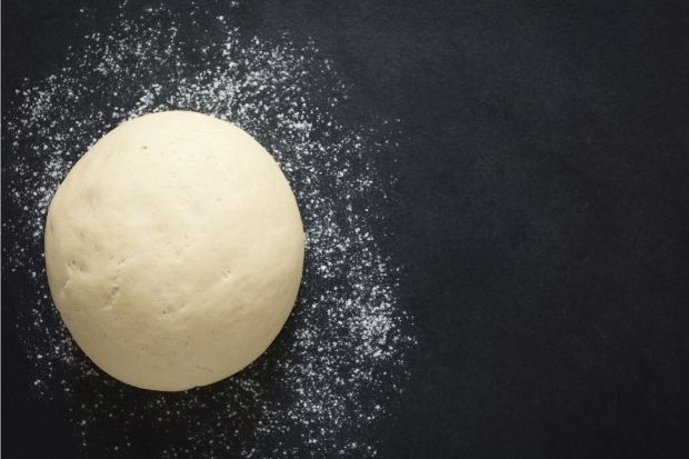 Ball of pizza dough sitting out after cook learned how long pizza dough can sit out before cooking