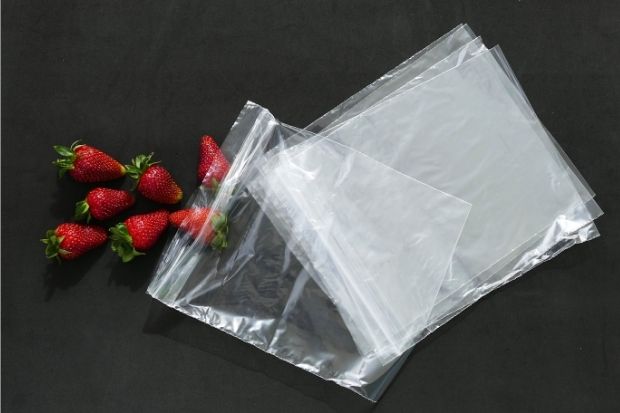 Strawberries next to fridge bags that were purchased after chef learned the difference between freezer and storage bags