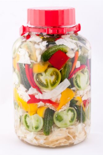 Vegetables pickling in jar after chef learned if you can pickle in plastic containers