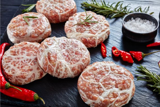 Meat wrapped in caul fat after chef learned what to use instead of sausage casing