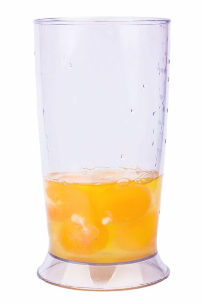 Glass of raw egg yolks that you shouldn't eat