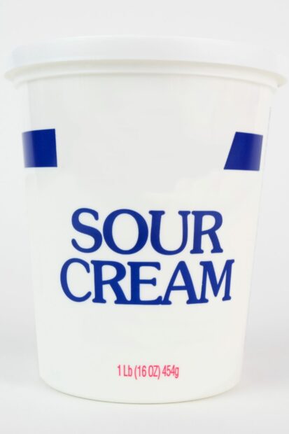 Container of sour cream that should not go in the microwave